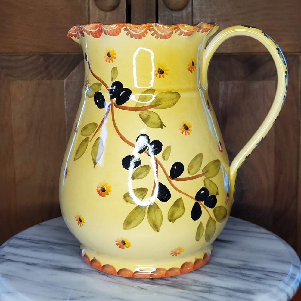 Handcrafted Ceramic Pitcher with Floral Design